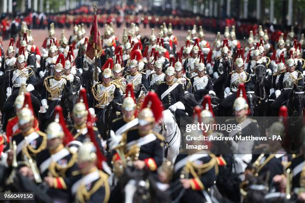 Members of the Household Cavalry make their way down The Mall after taking part in the Colonel's Review, the final rehearsal of the Trooping the...