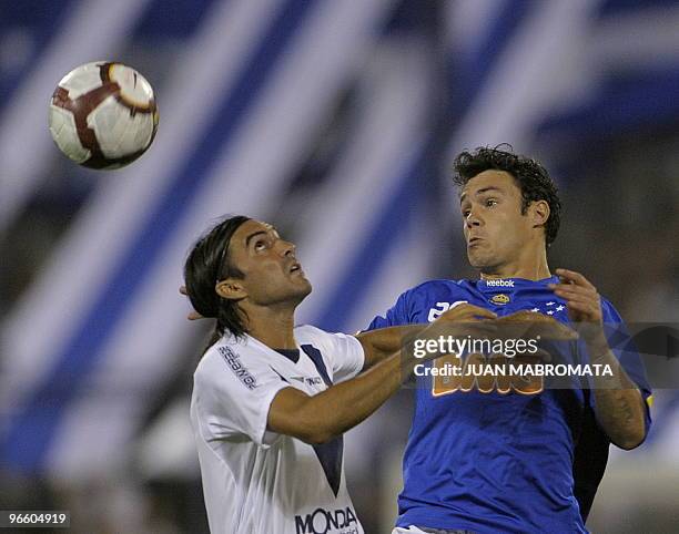 Brazil's Cruzeiro forward Kleber vies for the ball with Argentina's Velez Sarsfield defender Fabian Cubero during their Copa Libertadores 2010 Group...