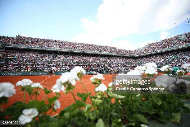 Richard Gasquet of France serves during the mens singles third round match against Rafael Nadal of Spain during day seven of the 2018 French Open at...