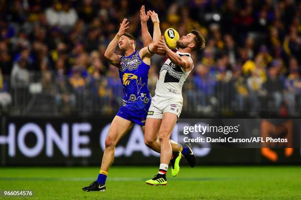 Jack Redden of the Eagles competes for the ball with Maverick Weller of the Saints during the 2018 AFL round 11 match between the West Coast Eagles...