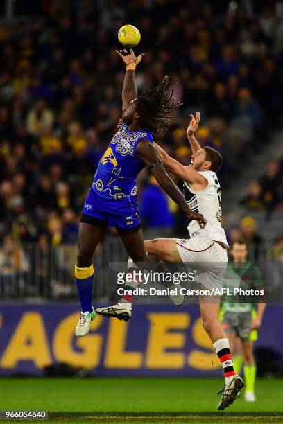 Nic Naitanui of the Eagles contests a ruck with Tom Hickey of the Saints during the 2018 AFL round 11 match between the West Coast Eagles and the St...