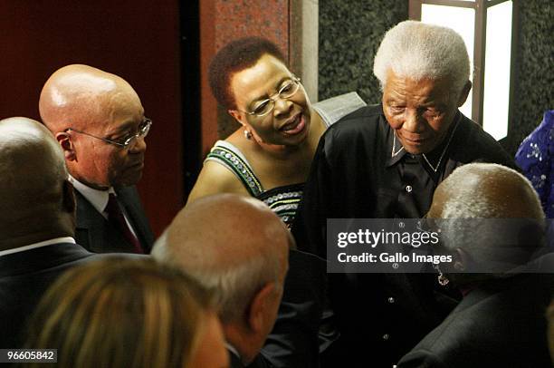 Nelson Mandela and his wife Graca Machel attend President Jacob Zuma's state of the nation address at the opening of Parliament on February 11, 2010...
