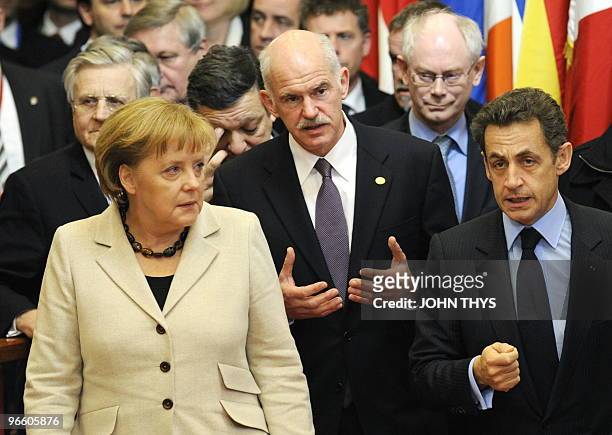 German Chancellor Angela Merkel, Greek Prime Minister George Papandreou, French President Nicolas Sarkozy and leave for a European Union summit...