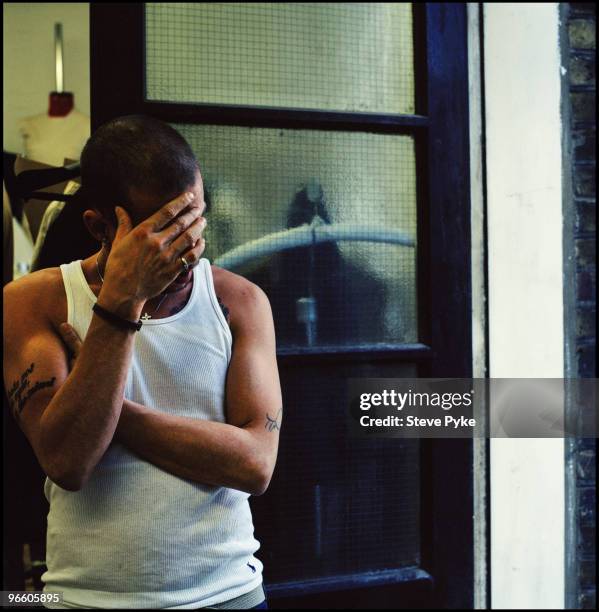 Fashion designer Alexander McQueen poses for a portrait shoot in London, UK.