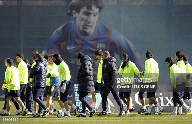 Barcelona's players take part in a training session at Ciutat Esportiva Joan Gamper in Barcelona on February 11, 2010. Barcelona will play a Spanish...