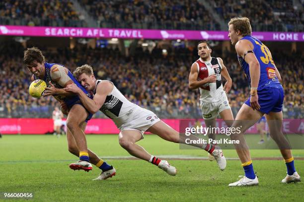 Andrew Gaff of the Eagles gets tackled by Jack Newnes of the Saints during the round 11 AFL match between the West Coast Eagles and the St Kilda...