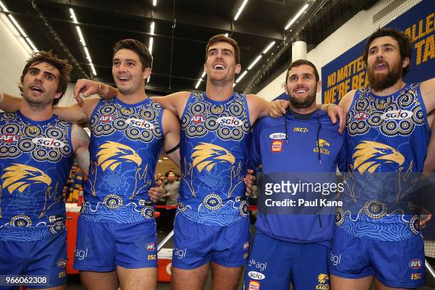Andrew Gaff, Tom Barrass, Scott Lycett, Jack Darling and Josh Kennedy of the Eagles sing the club song after winning the round 11 AFL match between...