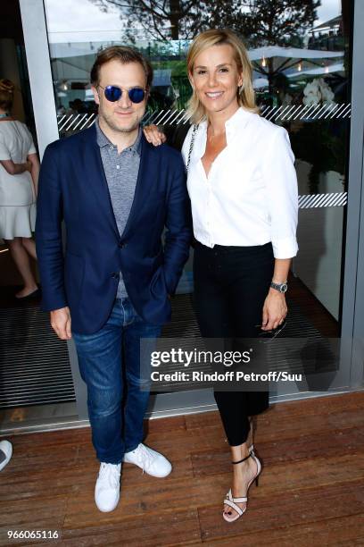 Violonist Renaud Capucon and his wife journalist Laurence Ferrari attend the 2018 French Open - Day Seven at Roland Garros on June 2, 2018 in Paris,...