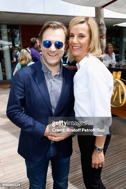 Violonist Renaud Capucon and his wife journalist Laurence Ferrari attend the 2018 French Open - Day Seven at Roland Garros on June 2, 2018 in Paris,...