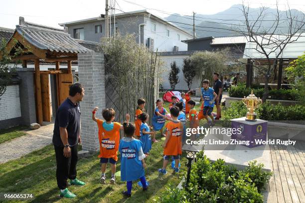 Children from Bokai Intellectual Quanna Kindergareten took part in a Get Into Rugby training session at the foothills of the Great Wall in Mutianyu...