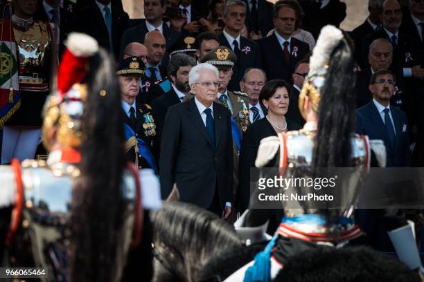 Italys Defence Minister Elisabetta Trenta and Italy's President Sergio Mattarella review the guard of honour during the ceremony to mark the...