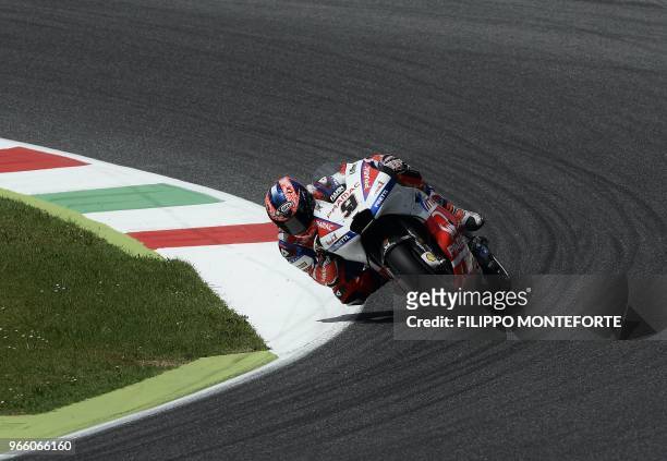 Alma Pramac Racing's Italian rider Danilo Petrucci takes a bend during the Moto GP qualifying session in the Italian Grand Prix at the Mugello track...