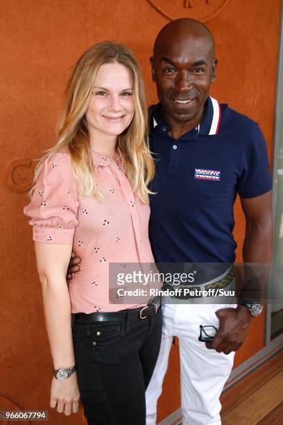 Actors Aurelie Nollet and Lucien Jean-Baptiste attend the 2018 French Open - Day Seven at Roland Garros on June 2, 2018 in Paris, France.