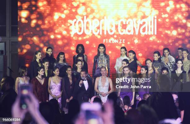 Antonio Banderas and Valeria Mazza are in the center with models during the Roberto Cavalli show at Miami Fashion Week 2018 Benefit Gala - Inside at...