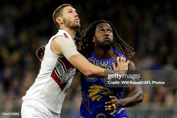 Tom Hickey of the Saints contests a ruck with Nic Naitanui of the Eagles during the round 11 AFL match between the West Coast Eagles and the St Kilda...