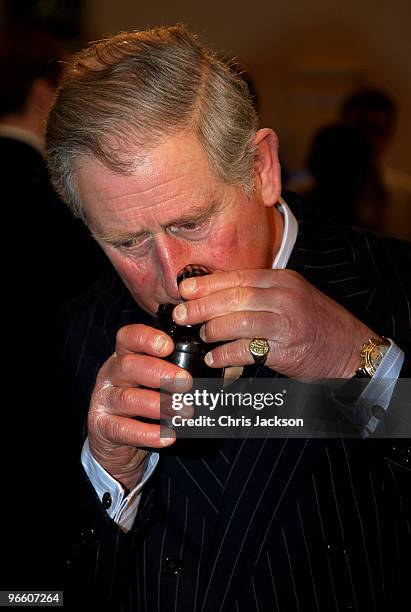 Prince Charles, Prince of Wales is given a pot of jam during a visit to St Mellitus College on February 12, 2010 in London, England. St Mellitus...