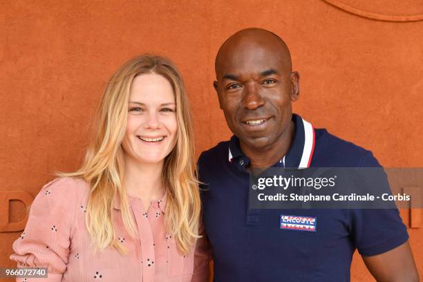 Actors Aurelie Nollet and Lucien Jean-Baptiste attends the 2018 French Open - Day Seven at Roland Garros on June 2, 2018 in Paris, France.