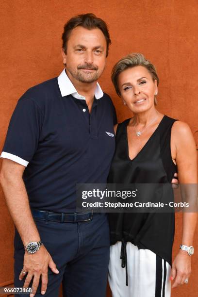 Henri Leconte and Maria Dowlatshahi attend the 2018 French Open - Day Seven at Roland Garros on June 2, 2018 in Paris, France.