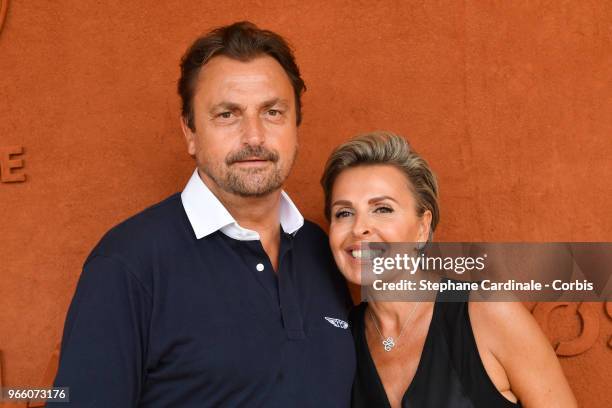 Henri Leconte and Maria Dowlatshahi attend the 2018 French Open - Day Seven at Roland Garros on June 2, 2018 in Paris, France.