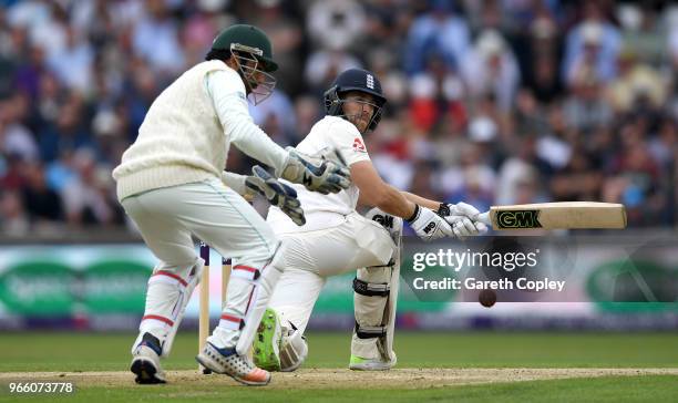 Dawid Malan of England hits past Pakistan wicketkeeper Sarfraz Ahmed during day two of the 2nd NatWest Test match between England and Pakistan at...