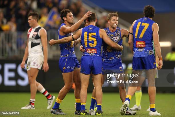 Brendon Ah Chee, Jamie Cripps, Mark LeCras and Josh Kennedy of the Eagles celebrate a goal during the round 11 AFL match between the West Coast...