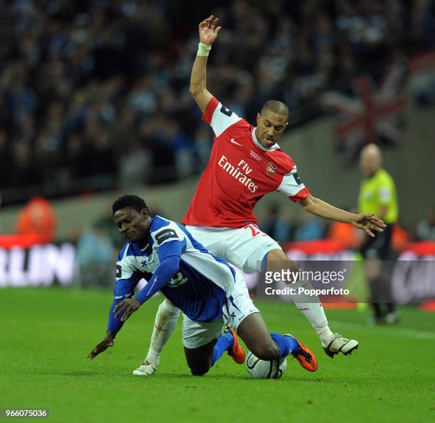 Obafemi Martins of Birmingham City is tackled by Gael Clichy of Arsenal during the Carling Cup Final between Arsenal and Birmingham City at Wembley...
