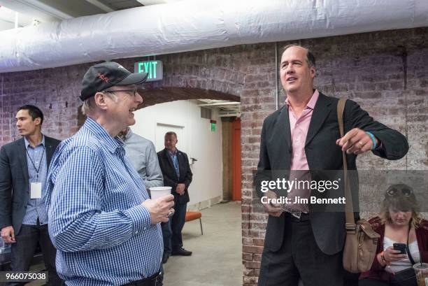 Microsoft co-founder and Upstream Music Festival creator Paul Allen and bassist Krist Novoselic of Nirvana and Giants in the Trees talk before Krist...