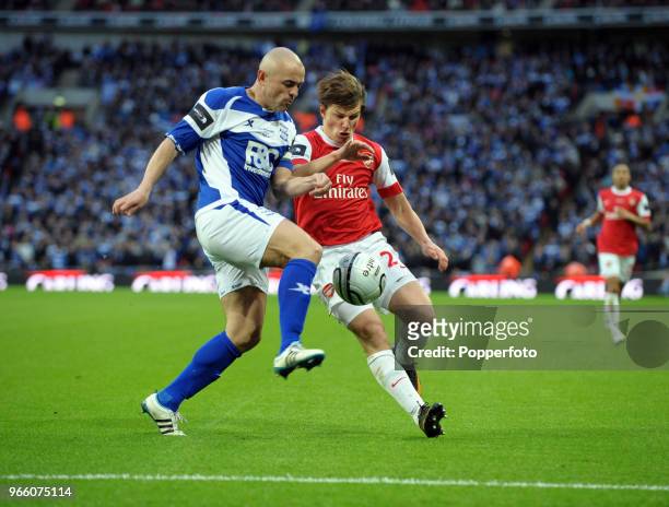Stephen Carr of Birmingham City battles with Andrey Arshavin of Arsenal during the Carling Cup Final between Arsenal and Birmingham City at Wembley...