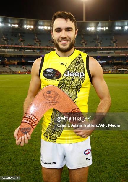 Shane Edwards of the Tigers poses for a photo after winning The Yiooken Award for best on ground during the 2018 AFL round 11 Dreamtime at the G...