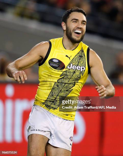 Shane Edwards of the Tigers celebrates a goal during the 2018 AFL round 11 Dreamtime at the G match between the Essendon Bombers and the Richmond...