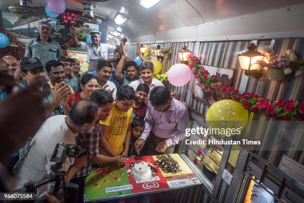 Deccan queen turns 89th today as people cuts the cake inside the train at Mumbai CST, on June 1, 2018 in Mumbai, India. The Deccan Queen, a daily...