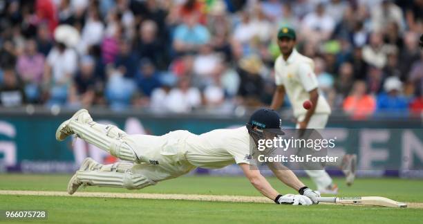 England batsman Dominic Bess dives to make his ground during day two of the second test match between England and Pakistan at Headingley on June 2,...
