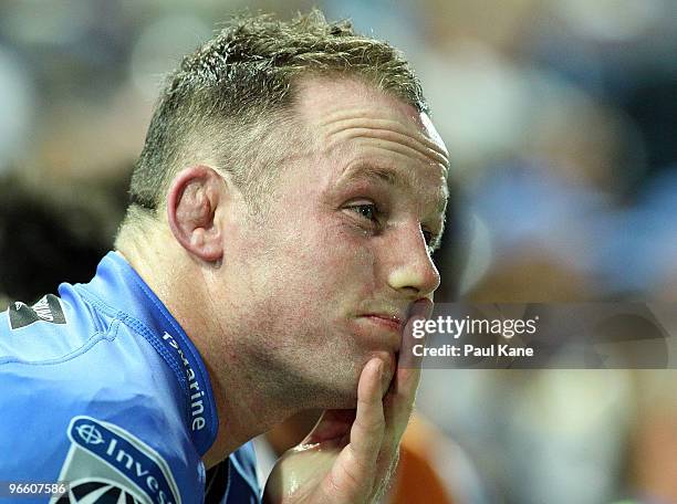 Richard Brown of the Force looks on after injuring his arm during the round one Super 14 match between the Western Force and the Brumbies at ME...