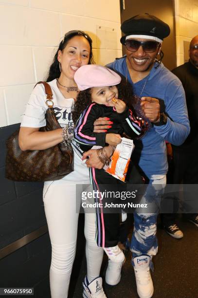Kangol Kid and Tajiri Swindell pose with their daughter at the YO! MTV Raps 30th Anniversary Live Event at Barclays Center on June 1, 2018 in New...