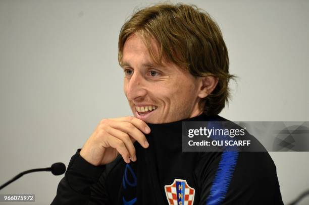 Croatia's midfielder Luka Modric attends a press conference at Anfield stadium in Liverpool on June 2 ahead their International friendly football...