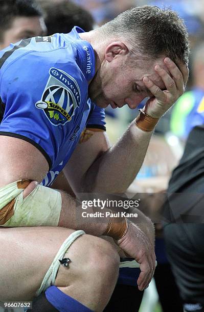 Richard Brown of the Force looks on after injuring his arm during the round one Super 14 match between the Western Force and the Brumbies at ME...