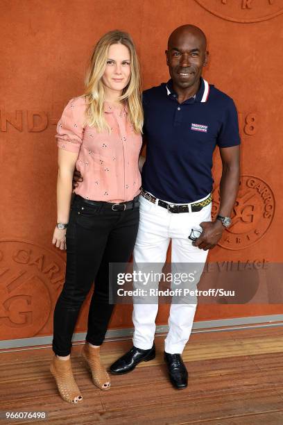 Actress Aurelie Nollet and Actor Lucien Jean-Baptiste attend the 2018 French Open - Day Seven at Roland Garros on June 2, 2018 in Paris, France.