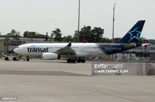 An Air Transat jet at at MontréalPierre Elliott Trudeau International Airport on June 1, 2018.