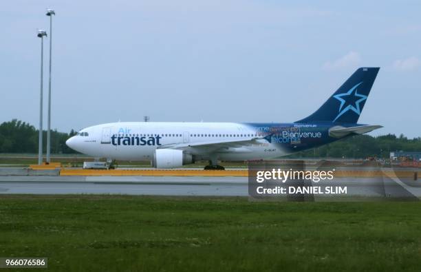 An Air Transat jet prepares to take off at at MontréalPierre Elliott Trudeau International Airport on June 1, 2018.