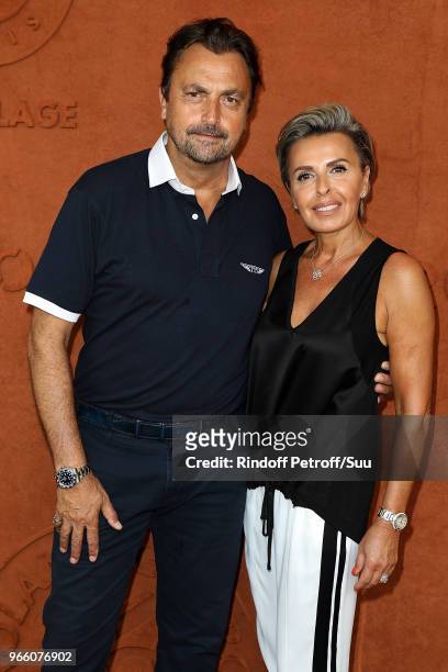 Former tennis champion Henri Leconte and his wife Florentine attend the 2018 French Open - Day Seven at Roland Garros on June 2, 2018 in Paris,...