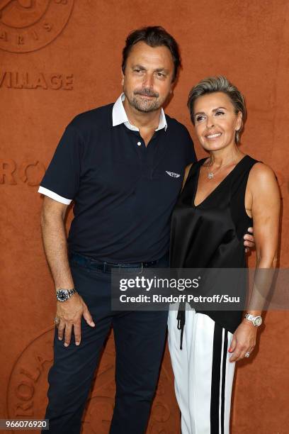 Former tennis champion Henri Leconte and his wife Florentine attend the 2018 French Open - Day Seven at Roland Garros on June 2, 2018 in Paris,...