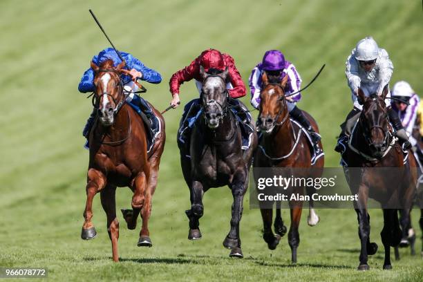 William Buick riding Masar win The Investec Derby from Dee Ex Bee during Investec Derby Day at Epsom Downs Racecourse on June 2, 2018 in Epsom,...