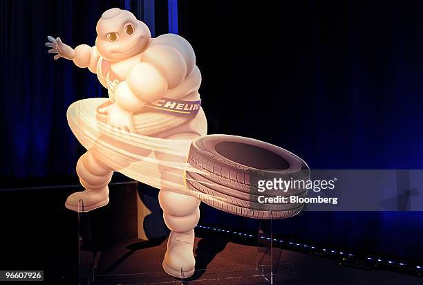 Cardboard cut out of the 'Michelin Man' sits on stage at a news conference in Paris, France, on Friday, Feb. 12, 2010. Michelin & Cie., the world's...