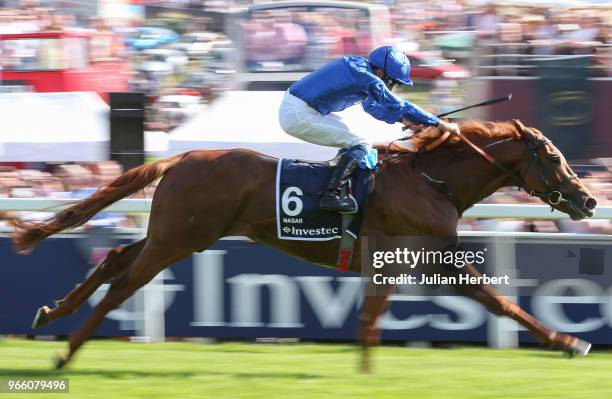 William Buick riding Masar wins The Investec Derby Race run during Investec Derby Day at Epsom Downs Racecourse on June 2, 2018 in Epsom, England.