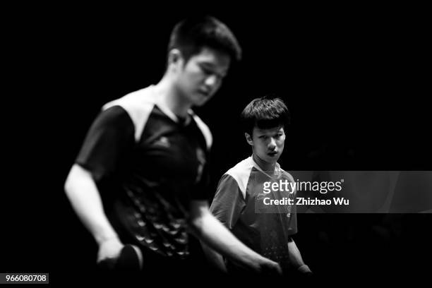 Lin Gaoyuan of China in action at the men's singles semi-final compete with Fan Zhendong of China during the 2018 ITTF World Tour China Open on June...