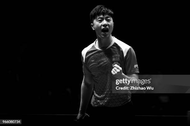 Ma Long of China in action at the men's singles quarter-final compete with Liang Jingkun of China during the 2018 ITTF World Tour China Open on June...