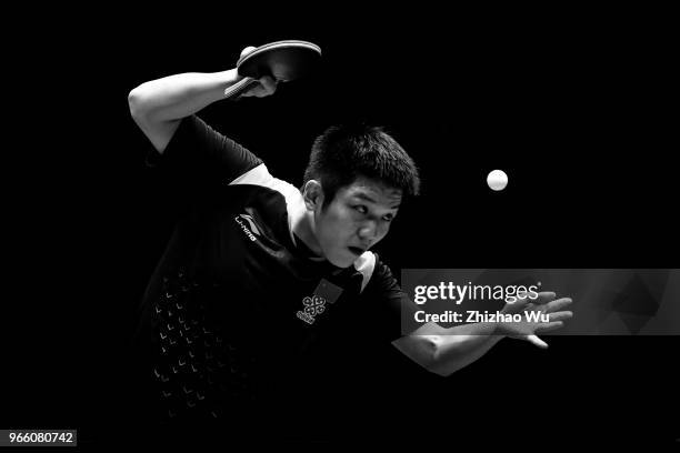 Fan Zhendong of China in action at the men's singles semi-final compete with Lin Gaoyuan of China during the 2018 ITTF World Tour China Open on June...