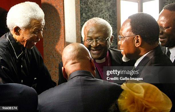 Former president Nelson Mandela with Archbishop Desmond Tutu, Deputy President Kgalema Motlanthe and President Jacob Zuma in Parliament on February...