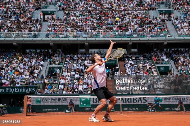 Richard Gasquet of France serves during his mens singles third round match against Rafael Nadal of Spain during day 7 of the 2018 French Open at...