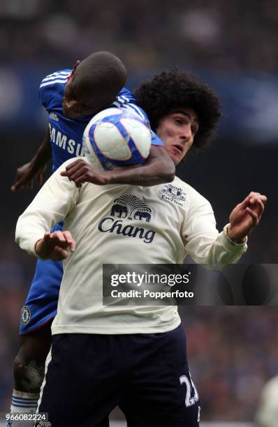 Ramires of Chelsea clashes with Marouane Fellaini of Everton during the FA Cup 4th round replay match between Chelsea and Everton at Stamford Bridge...